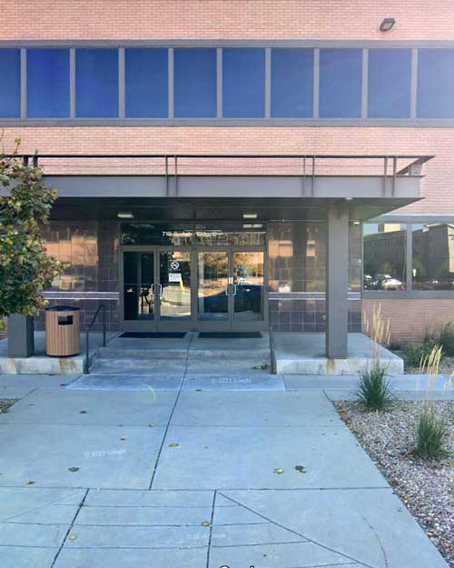 Exterior view of the Colorado Child Care Assistance Program (CCCAP) building, which provides support to families for managing daycare costs in Colorado.