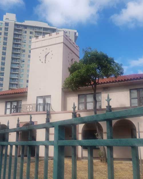 Exterior view of the Hawaii Department of Human Services (DHS) building, overseeing daycare costs and childcare regulations in Hawaii.