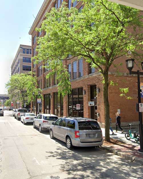 Exterior view of the Iowa Department of Human Services (DHS) building, overseeing daycare costs and childcare regulations in Iowa.