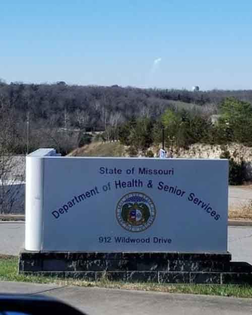 Exterior view of the Missouri Department of Health and Senior Services building, which oversees daycare cost regulations in Missouri.